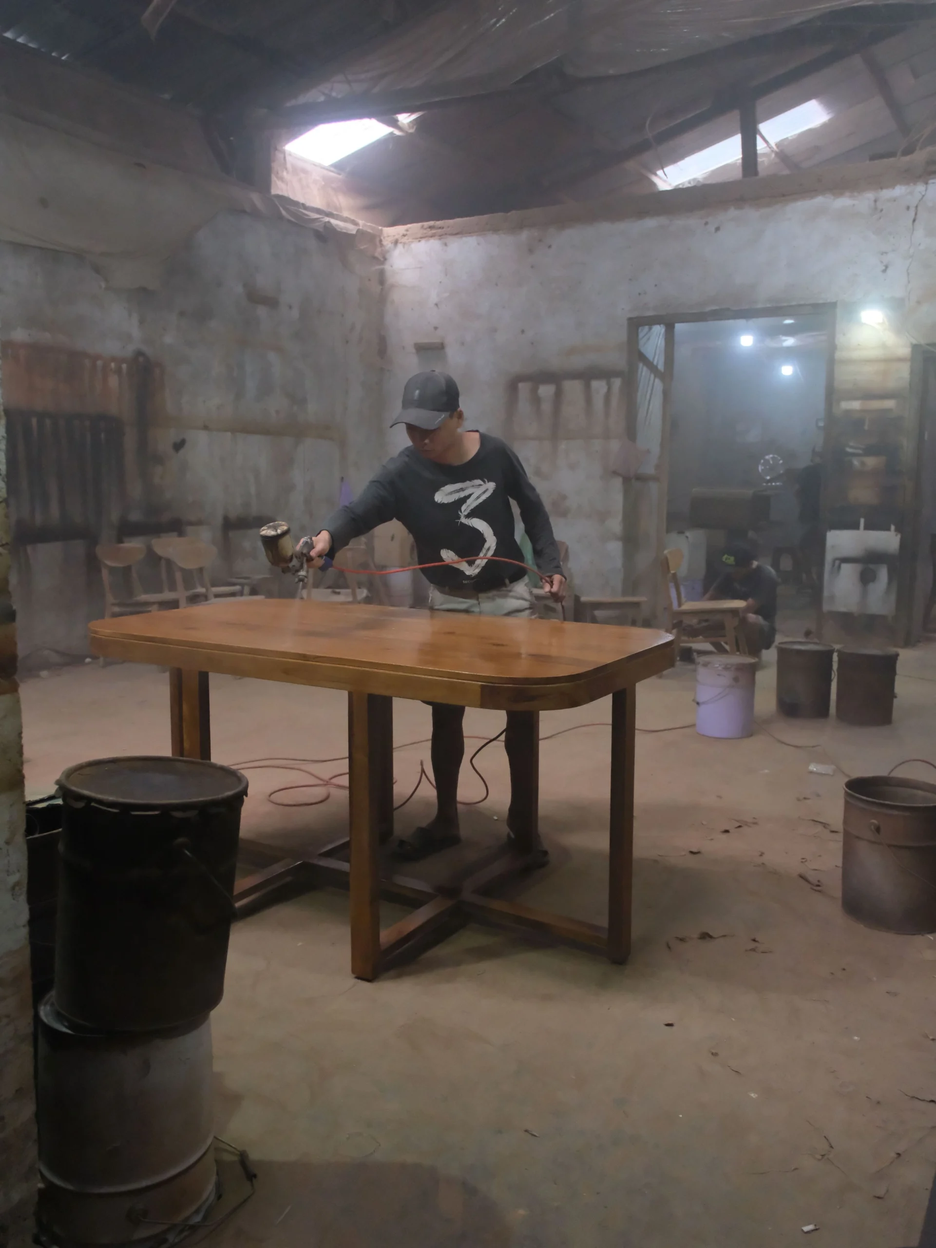 Finishing of solid teak furniture at Apta Living, Jepara Indonesia